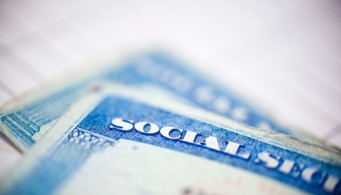 Social security cards with a blurry background.