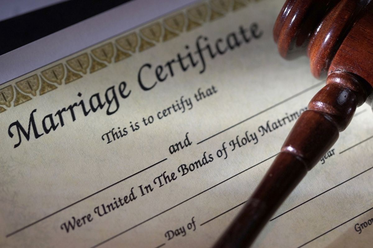 Marriage certificate record placed near the gavel