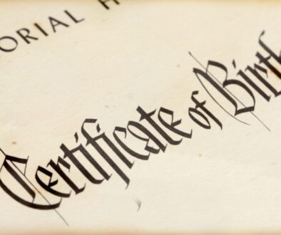 An old and yellowed certificate of birth.