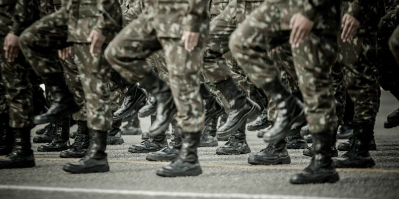 A picture of legs of military personnel marching